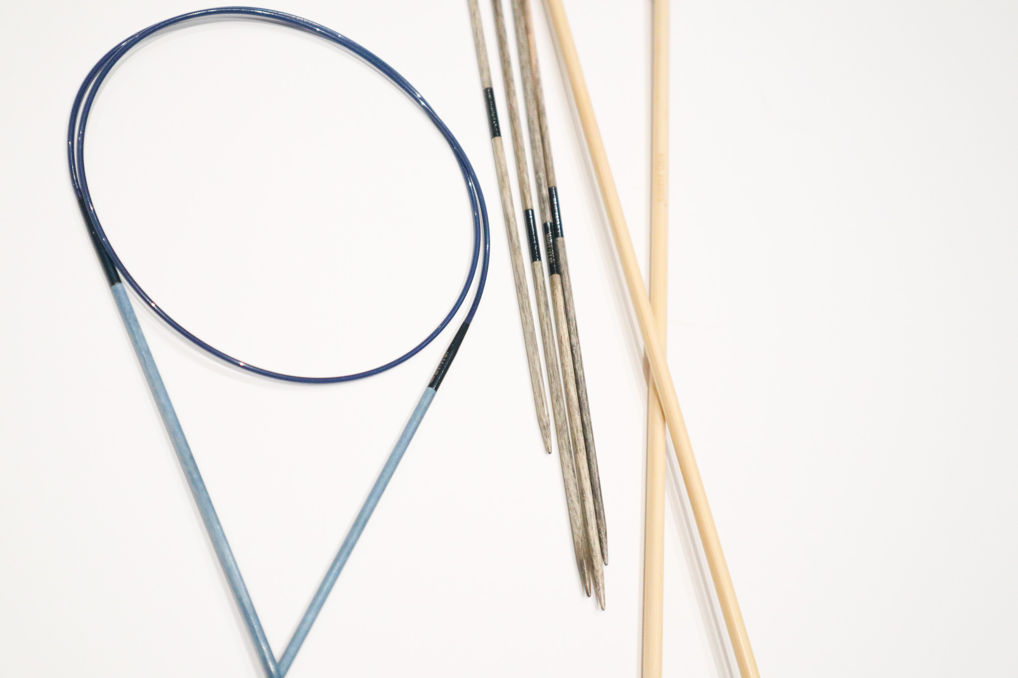 different knitting needles. Circular, double-pointed, and straight knitting needles